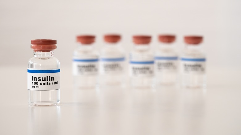Insulin vials against white background