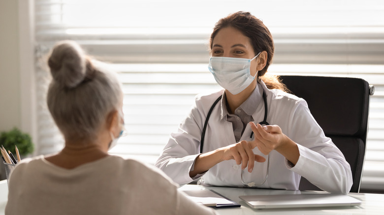 Doctor speaking with a patient