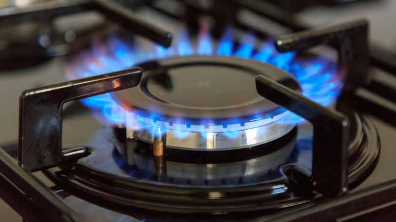 Blue flames from stovetop burner