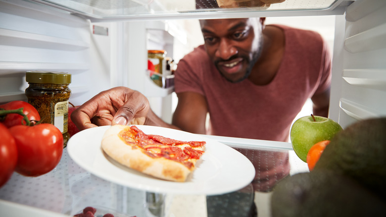 pepperoni pizza slice in refrigerator