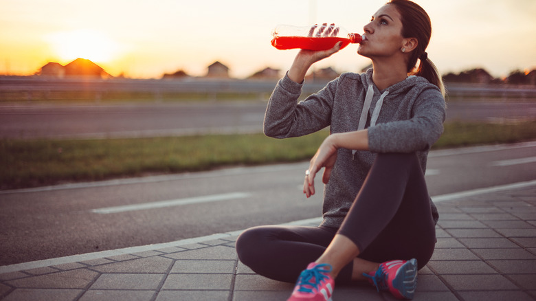 Woman drinking sports drink