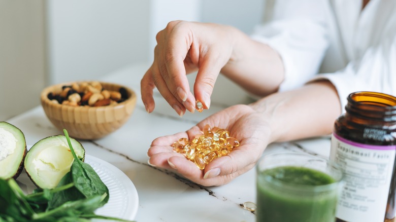 woman taking vitamins