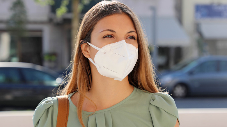 woman wearing mask