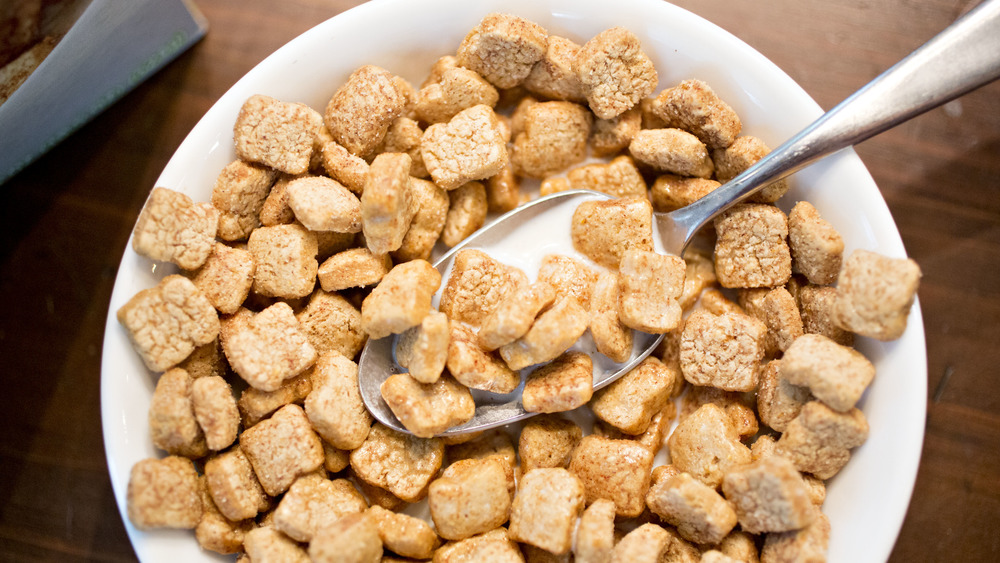 A bowl of healthy looking cereal with milk 