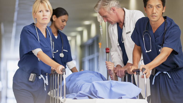 patient being rushed into the emergency room