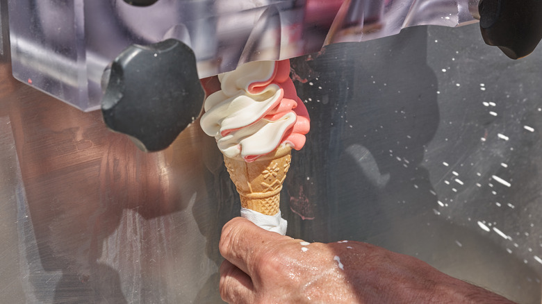 Soft serve ice cream machine dispensing ice cream