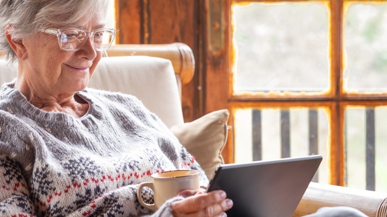 Seated smiling senior woman