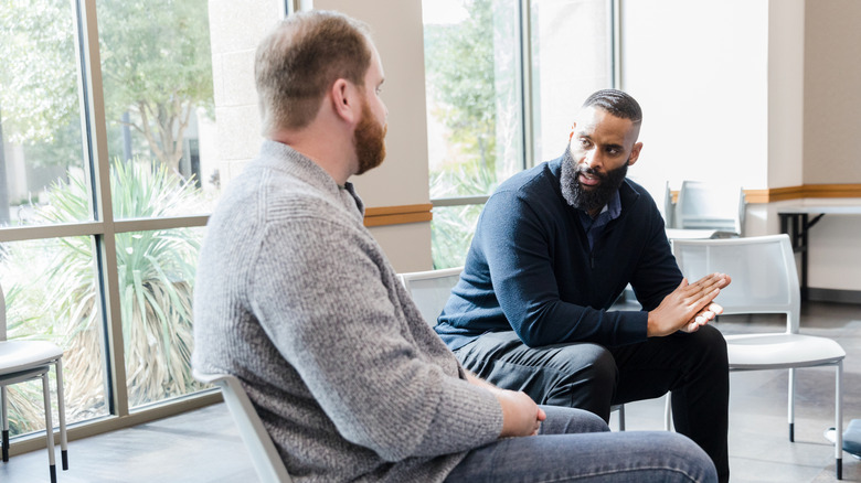 man at mental health therapy session