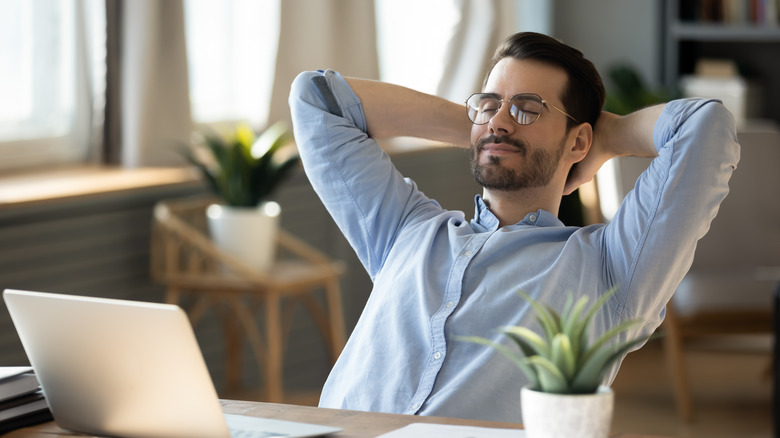 Man relaxing at work
