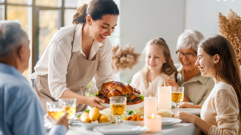 family enjoying Thanksgiving dinner