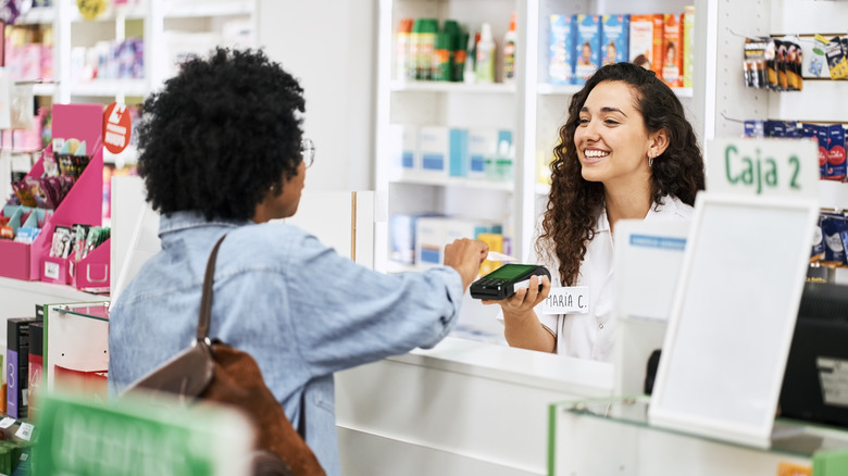 customer talking to pharmacist