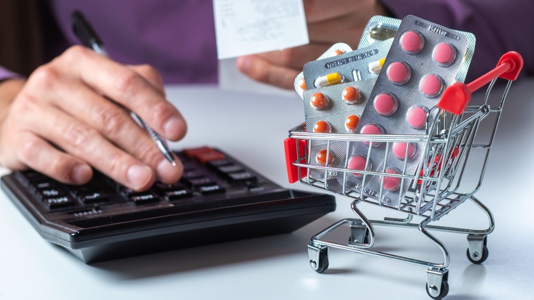 calculator next to prescription drugs