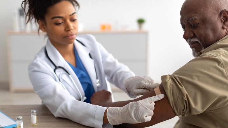 Older man getting flu shot