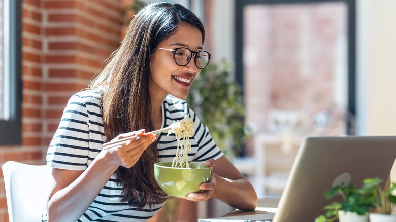 Woman eating konjac noodles for heart health