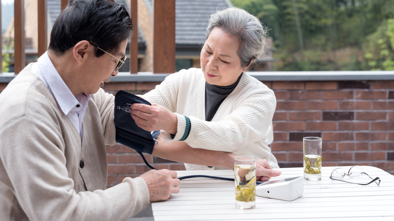 couple taking blood pressure