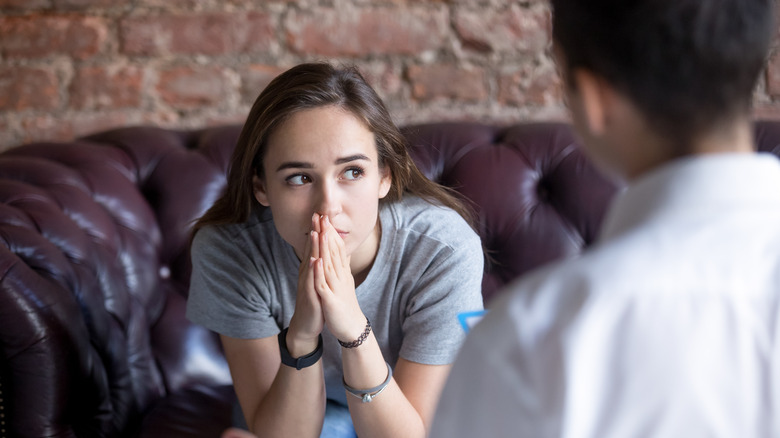 Doctor and patient with drug addiction 