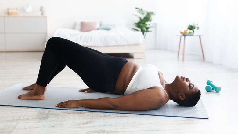 woman performing hip bridge 