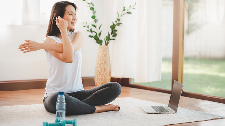 Young woman exercising