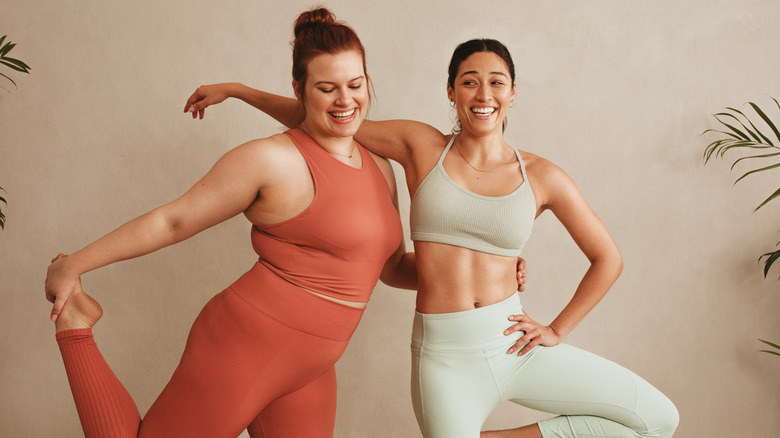 Two women doing yoga together