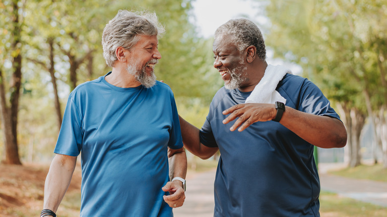 Older men walking in park