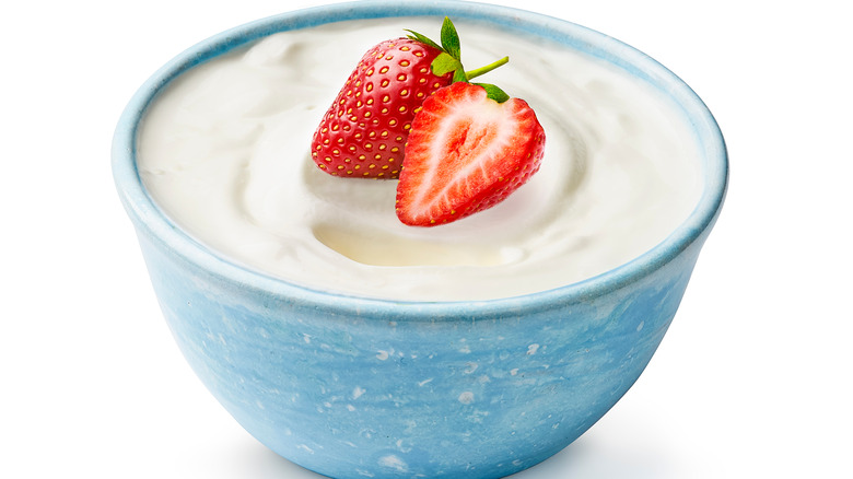 bowl of yogurt with strawberries