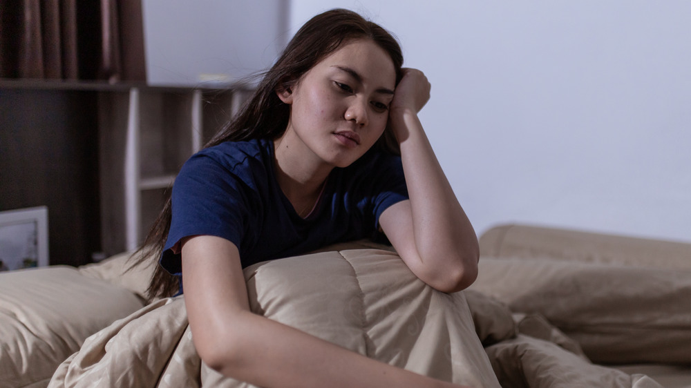 woman awake in bed