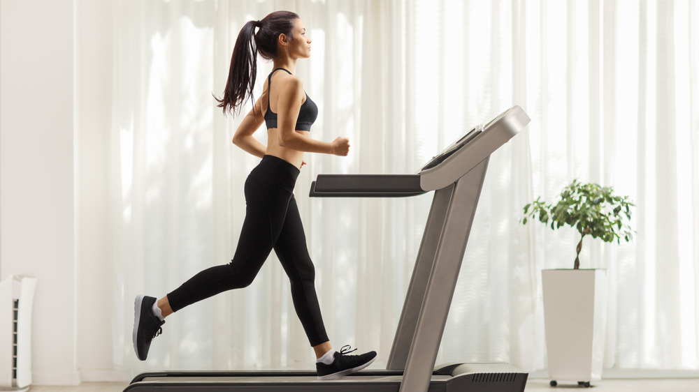 Young woman on treadmill