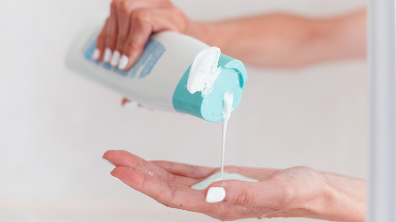 Bar of soap in person's hand