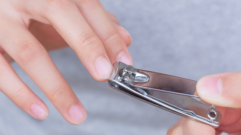 Hand clipping finger nails