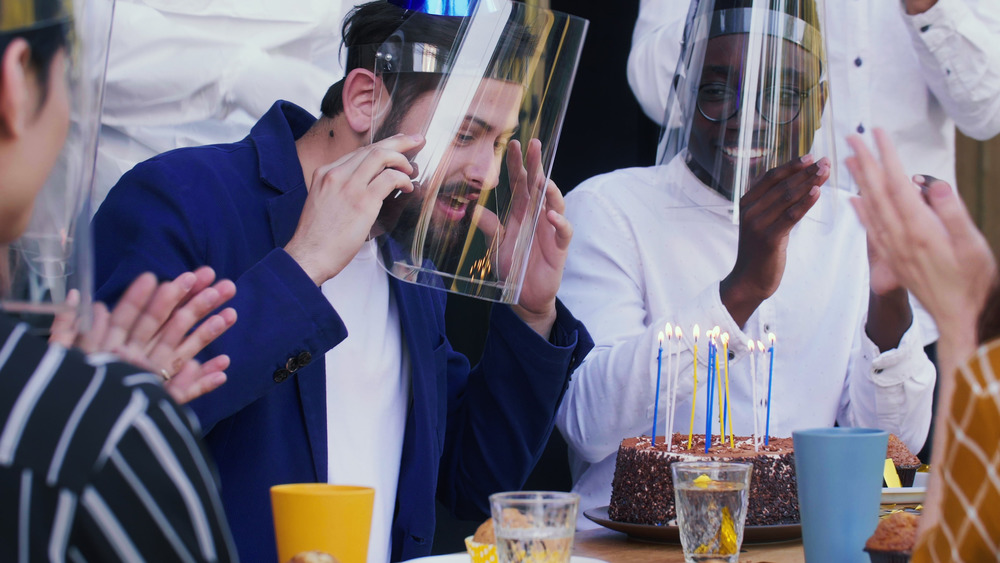 Face shield and birthday cake
