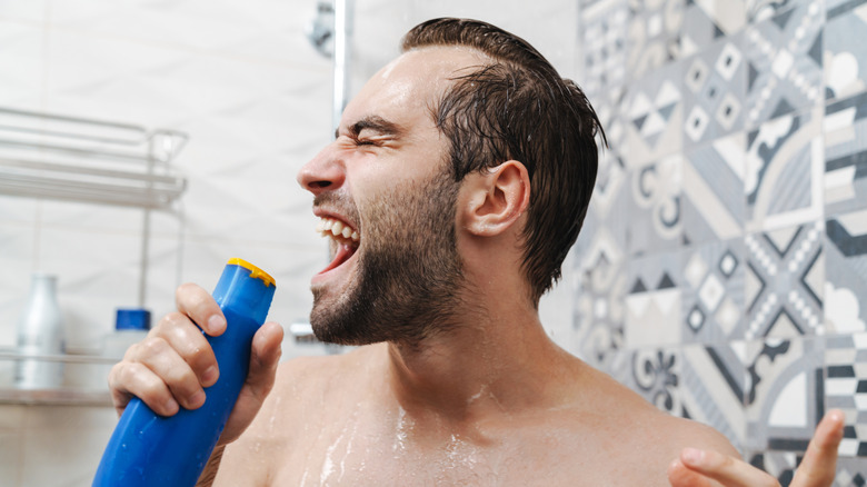 man singing in the shower