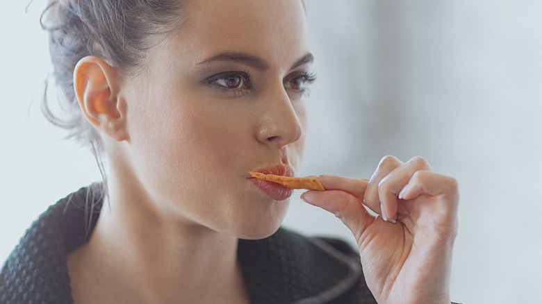 Woman eating a snack