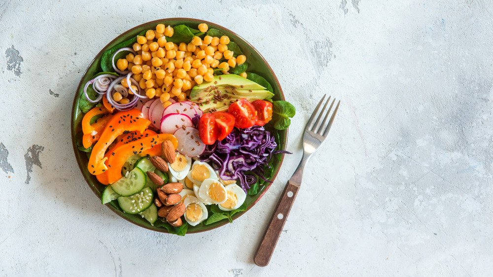 Bowl full of colorful vegetables and proteins
