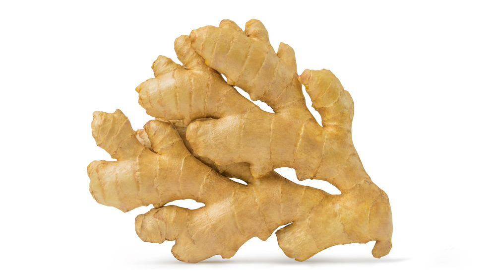 Fresh ginger on white background