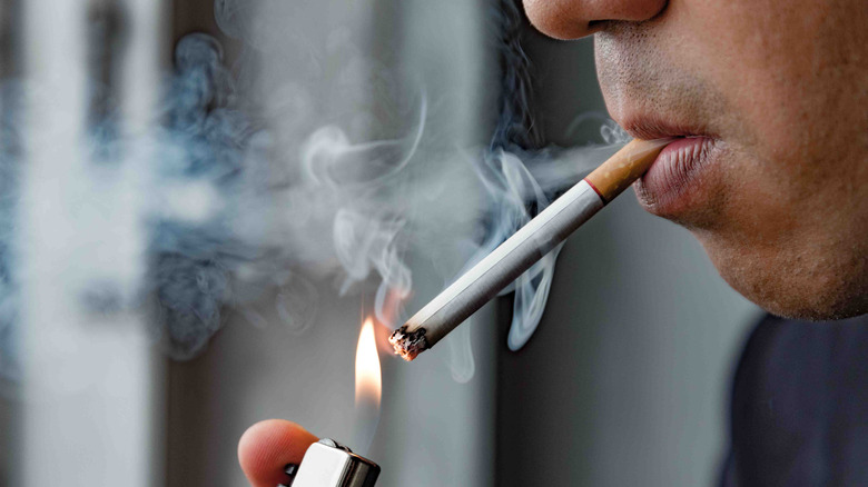 Close up of man smoking a cigarette 