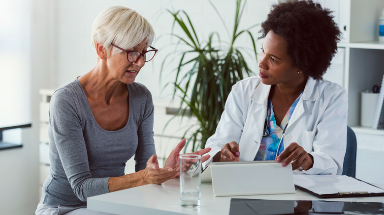Doctor speaking with patient 