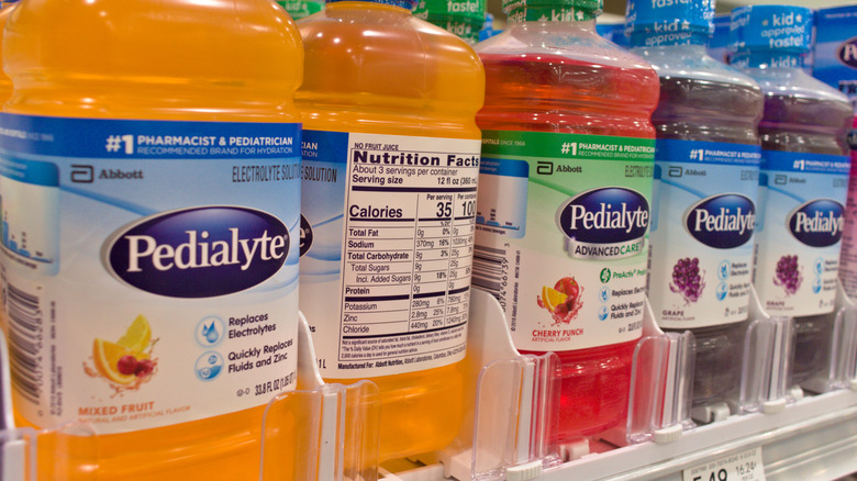 Row of different flavor Pedialyte bottles