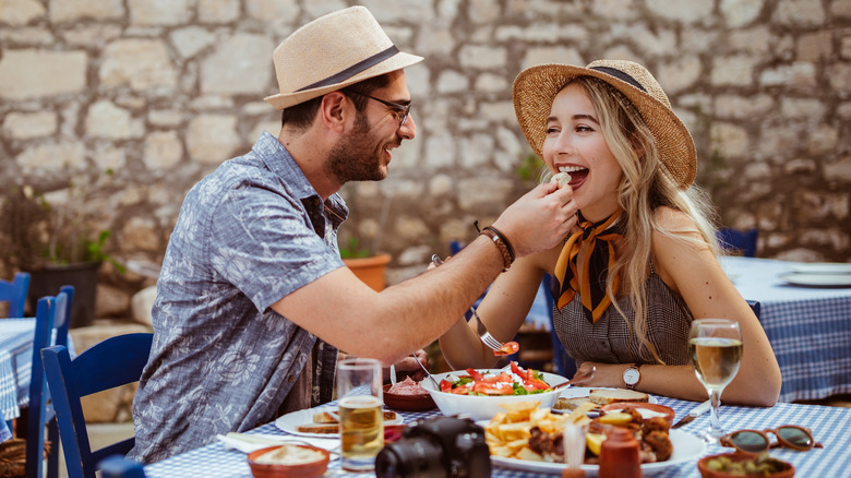 Couple eating on vacation