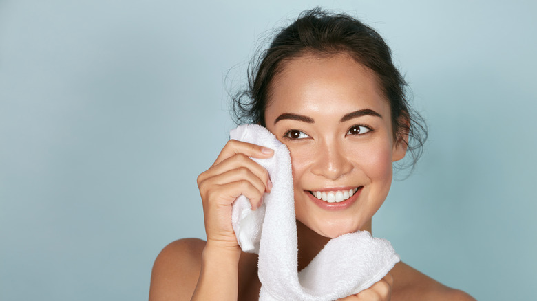 woman washing face