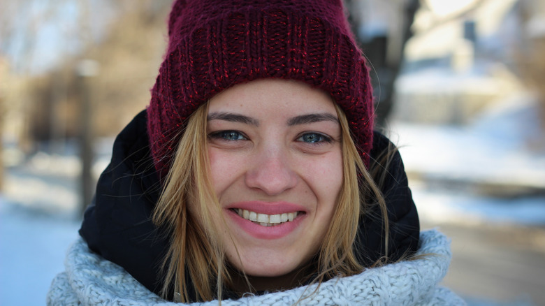 Cold woman with watery eyes 