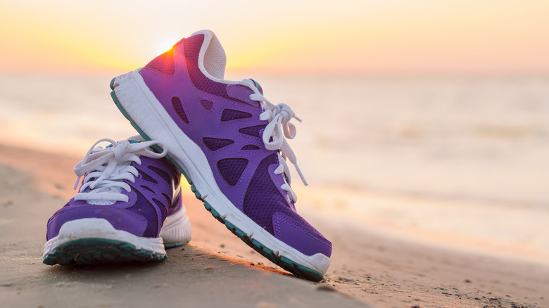Pair of sneakers on beach