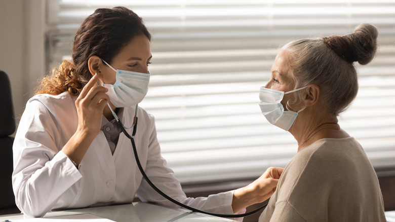 A woman visits a doctor