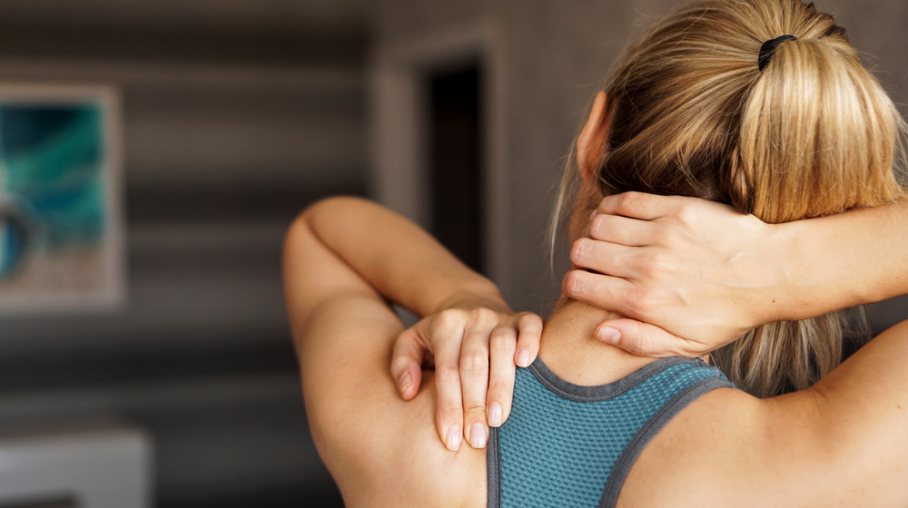 woman running with hurt back 