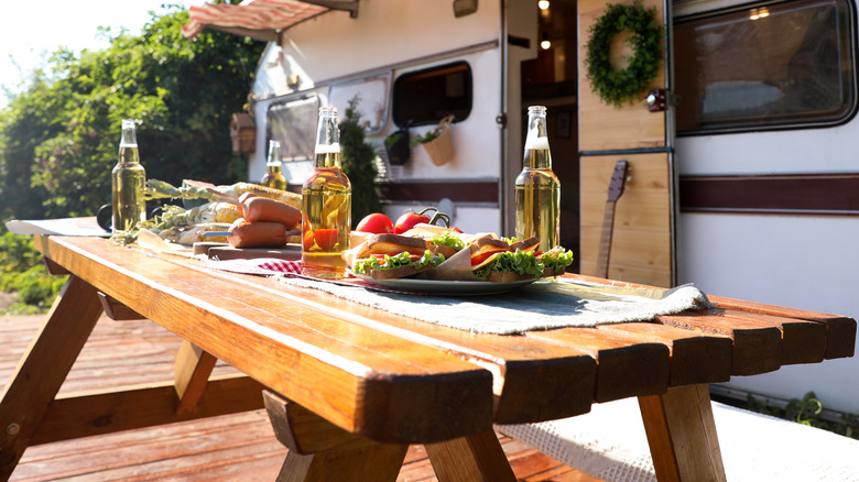 Food on a picnic table on a sunny day