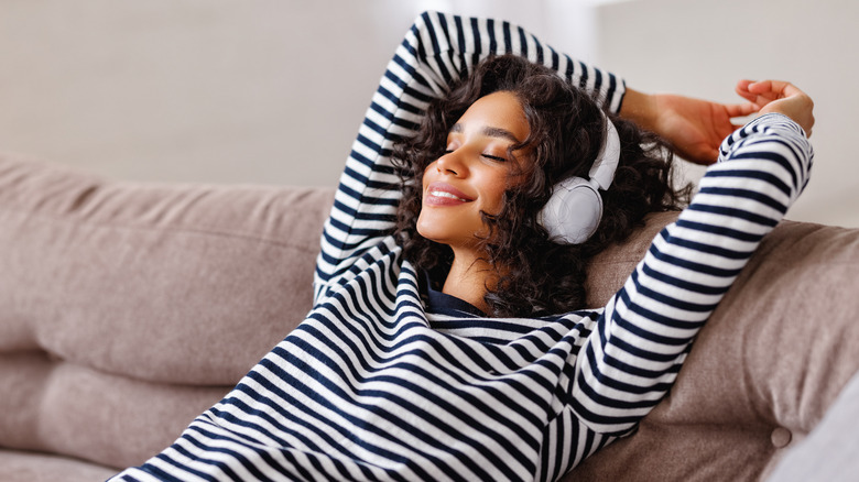 woman relaxing with headphones