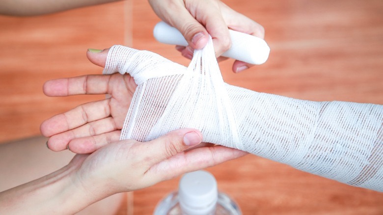 first -degree burn being wrapped in bandage
