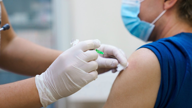 Someone gets vaccinated