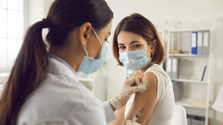 Older woman getting vaccine