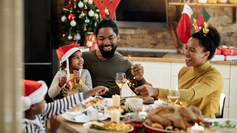 family celebrating at table
