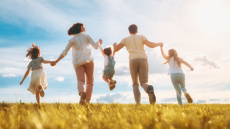 family of 5 walking outside